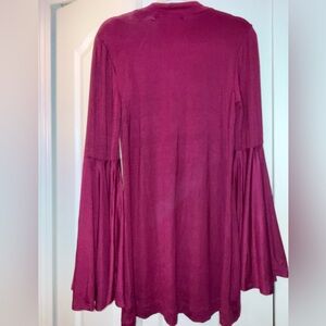 FP Movement by Free People Long Sleeve Dress with Bell Sleeves in a Rich Magenta